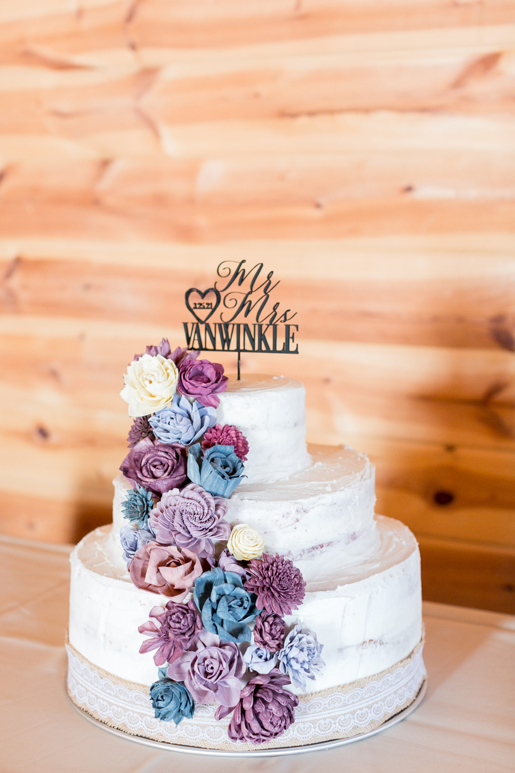 Wedding Cake with purple flowers